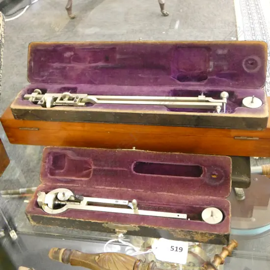 4 CASED TOOLS; 2 POLAR PLANIMETERS, COMPASS SET, WOODEN RULERS