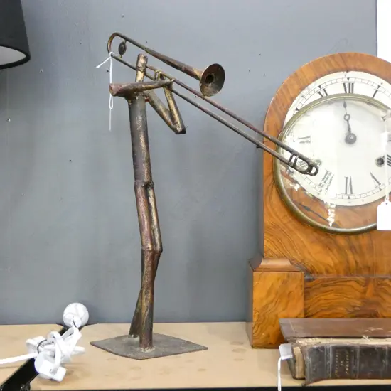 BRONZED METAL FIGURE OF A TROMBONE PLAYER H 430 MM