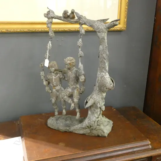 SPELTER COUPLE ON A SWING H.550mm