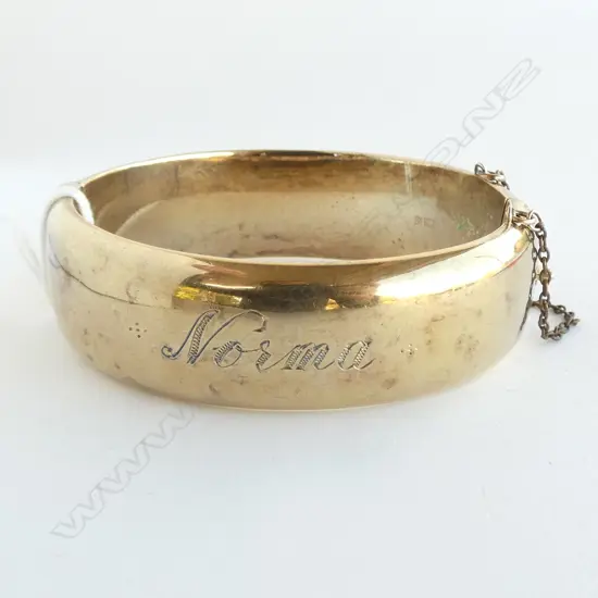 WIDE SILVER GILT HALF HINGED BANGLE engraved 'Norma' 30gms