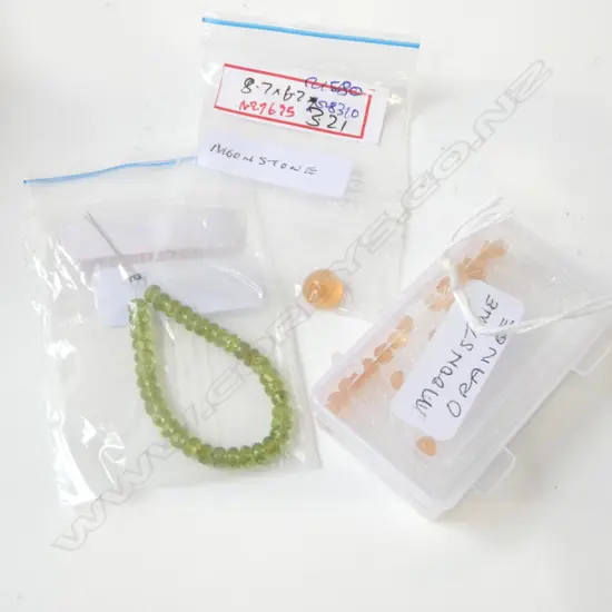 LOSE MOONSTONE CABOCHONS & 38 LOSE FACET CUT PERIDOT 16.34ct