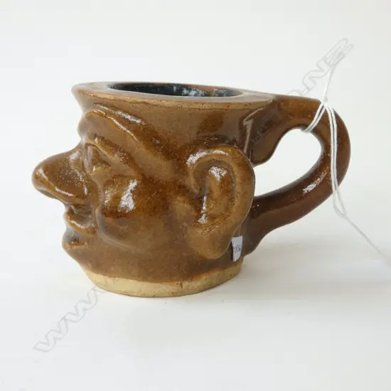 MOULDED FACE POTTERY MUG, 'RCH' INCISED BASE H.80mm