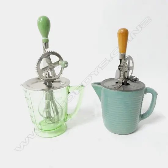(3389/3025/3131) 2 VINTAGE HAND HELD ROTARY BEATERS ON JUGS (GREEN & CERAMIC) H.320mm