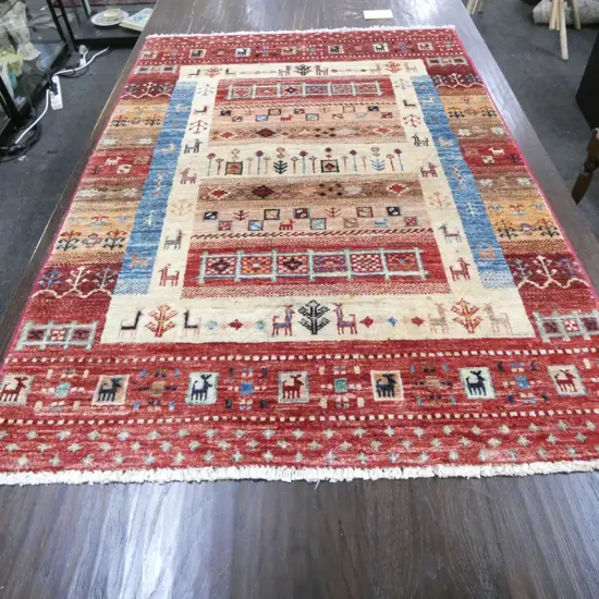 HAND KNOTTED WOOL PILE RUG 1160x815mm