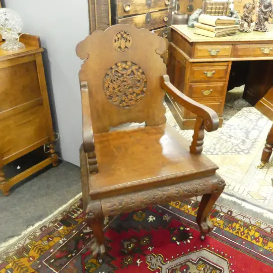 CHINESE HARDWOOD CARVED OPEN ELBOW CHAIR