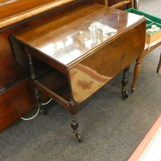 MAHOGANY TEA TROLLEY W.710mm