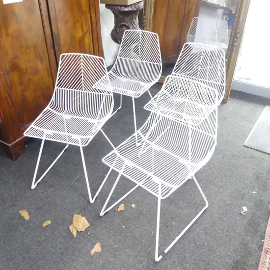 4 WHITE METAL CHAIRS