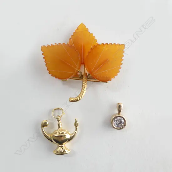 3 GOLD PCES; 9CT OIL LAMP CHARM not marked 2.1grms, CZ PENDANT 1.1grms, 9CT LEAF BROOCH 