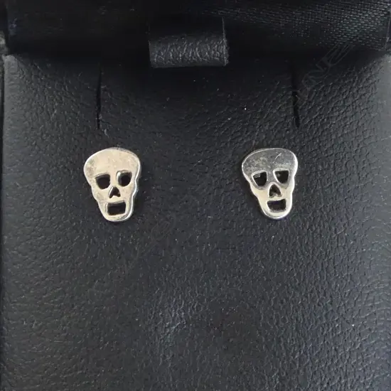 PR KAREN WALKER STG SILVER SKULL EARINGS