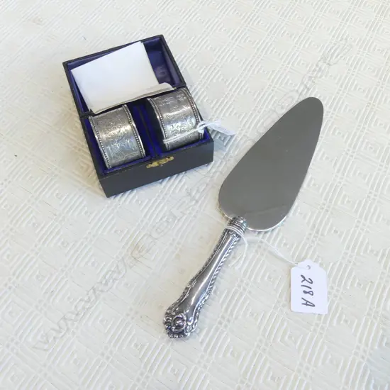 PR CASED STG SILVER NAPKIN RINGS, 47grms + STG HANDLED CAKE SERVER