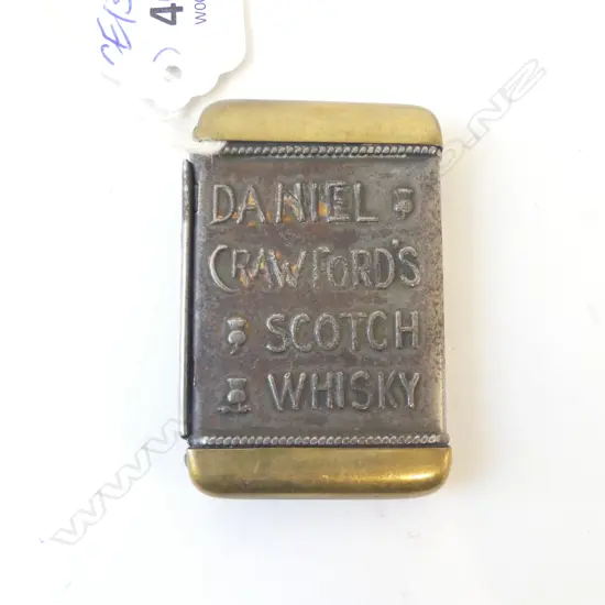 Steel & brass early 20thC ADVERTISING VESTA 'DANIEL CRAWFORD Scotch Whisky...' 'Daniel Crawford's Scotch Whisky