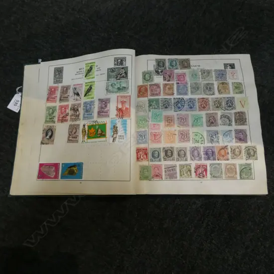 GOOD VINTAGE WORLD STAMP ALBUM INCLUDES 30 PLUS COMMONWEALTH  SIDE FACE QUEENS