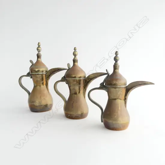 3 MIDDLE EASTERN COPPER JUGS H.305mm
