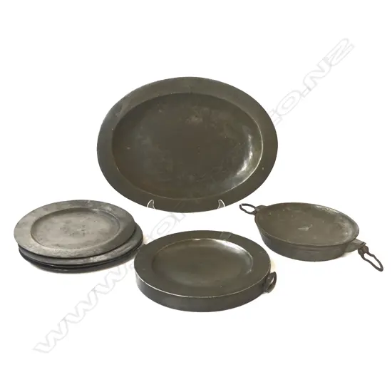 7 PCES PEWTER; 4 PLATES 245mm dia, 2 WARMERS, OVAL PLATTER W.400mm
