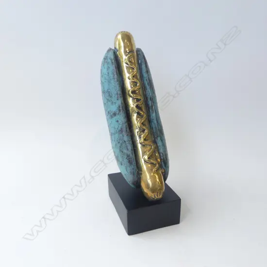 BRONZE HOT DOG ON STAND SIGNED BRUNO C. H.340mm