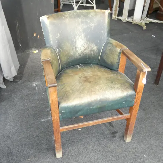 VINTAGE GREEN LEATHER ARMCHAIR