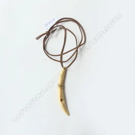 CONTEMPORARY MAORI CARVED SPERM WHALE PENDANT