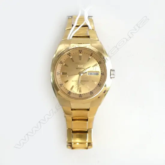 SEIKO 5 STAINLESS STEEL & GOLD PLATE GENT'S WRISTWATCH '100m Water Resist' automatic glass back. Running. 23 jewel. Lge 