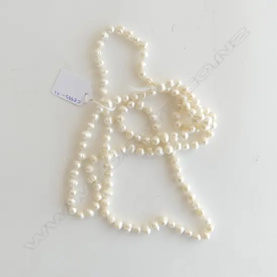 LONG STRING OF PEARLS fresh water semi baroque basically uniform L.1200mm