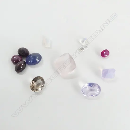 ASST. LOOSE CUT STONES INCLD. STAR SAPPHIRE CABOCHONS, QUARTZ, RUBY, ETHIOPIAN OPAL ETC