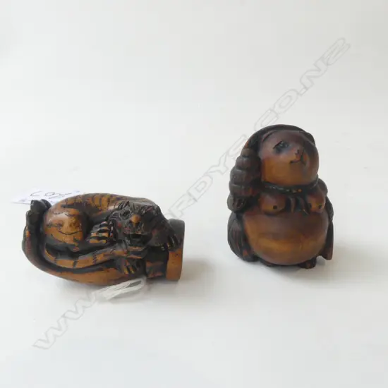 2 CARVED WOOD NETSUKE, SHISHI DOG IN GLOVE & OTHER, SIGNED