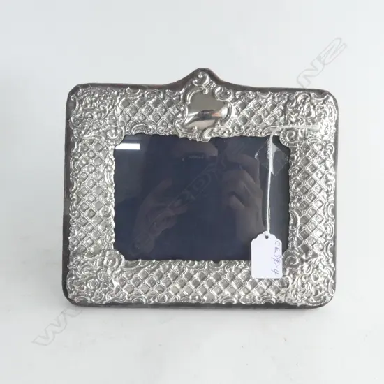 SILVER PHOTO FRAME with fancy trellis detail. Landscape format. Blue/black velvet backing 190 x 220mm