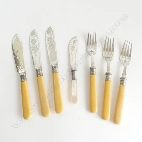 6 IVORINE 'BONE' HANDLED KNIVES & FORKS + 1 MOP HANDLED KNIFE