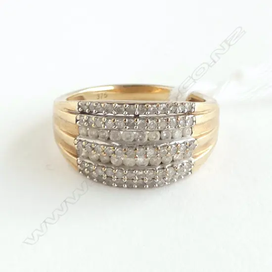 9ct Y/GOLD & MULTI small DIAMOND 7 band RING 3.78gms. SIZE N