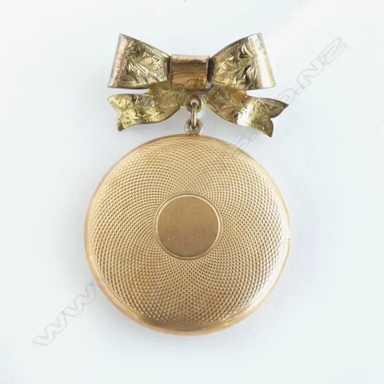 15CT LOCKET (10.3grm APPROX) ON RG BOW BROOCH 13.7grms total