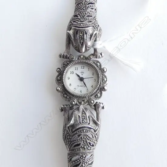 SILVER & MARCASITE LADIES WRISTWATCH with two tiger strap. Stainless steel back. Quartz movement 