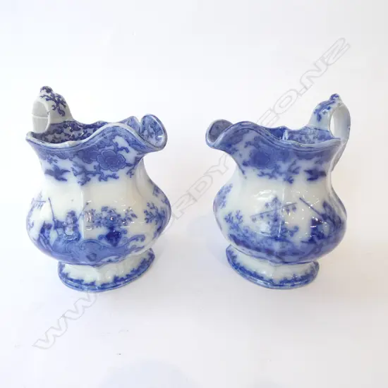 PR EARLY 19thC FLOW BLUE SCINDE PITCHERS marked NANKIN, RH & CO to base, H.185mm