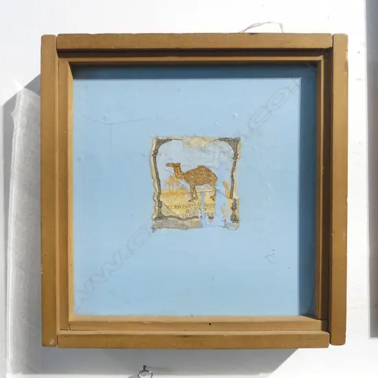 Frank Womble (1946-) 'Early Workz' painted assemblage 170mm x 165mm. Another work verso. Cigarette label & blue enamel. Provenance: From an artists estate