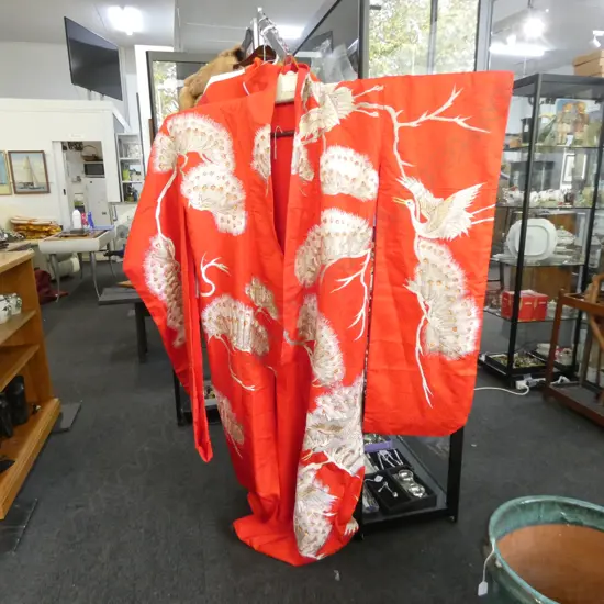 A VERY LARGE RED KIMONO 