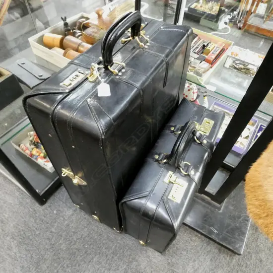 2 BLACK LEATHER SUITCASES H.640mm