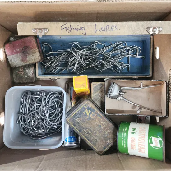 ASST. FISHING ITEMS. big game hooks, vintage tins, etc.
