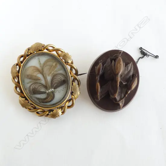 2 VICTORIAN MOURNING BROOCHES; PINCHBECK & VULCANITE