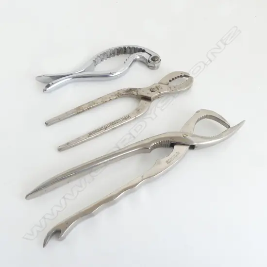 3 OLD CHAMPAGNE CORK OPENING CLAMPS: 1 marked Veuve Clicquot-Ponsardin