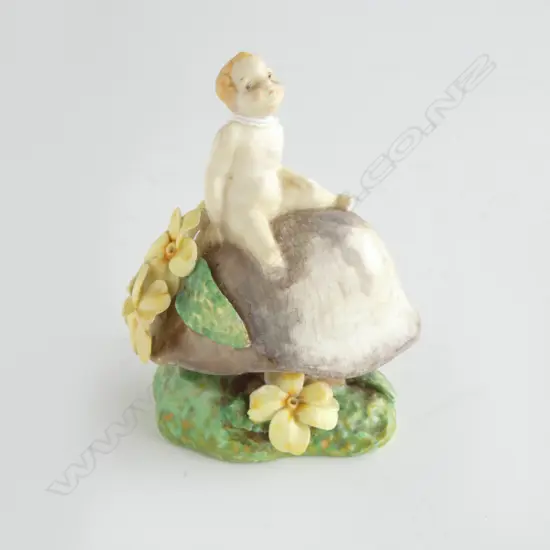 DOULTON 'FAIRY HN.1374' FIGURE on toadstool Rd.No.752766 H,100mm. minor faults