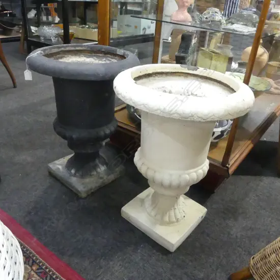 2 FIBERGLASS URNS, BLACK & WHITE H.550mm