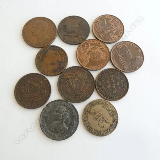 11 OLD NZ TOKENS: 6 various Milner & Thonpson's Music Depot + 2 x Victuallers Assoc. + Wairarapa Farmers co-op 20/- etc