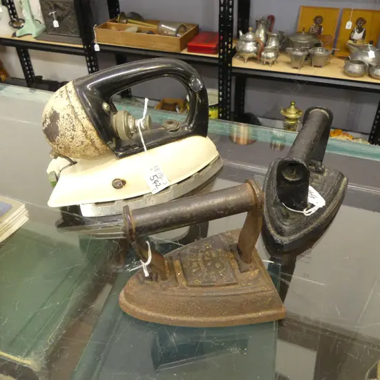 THREE OLD IRONS ONE CREAM GAS PUMP TYPE