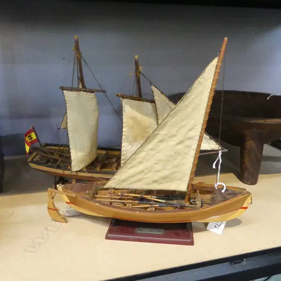 2 WOODEN MODEL BOATS ON STANDS, 'BALENIERE' & 'SANTISIMA TRINIDAD' L.390mm