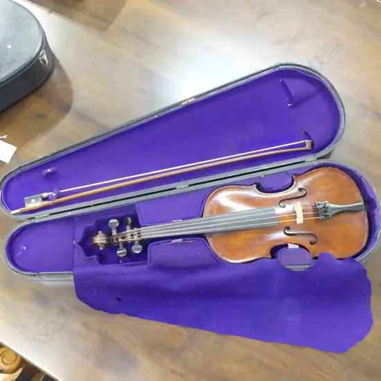 OLD VIOLIN labelled Nicolais Amatus in ebonised case with bow