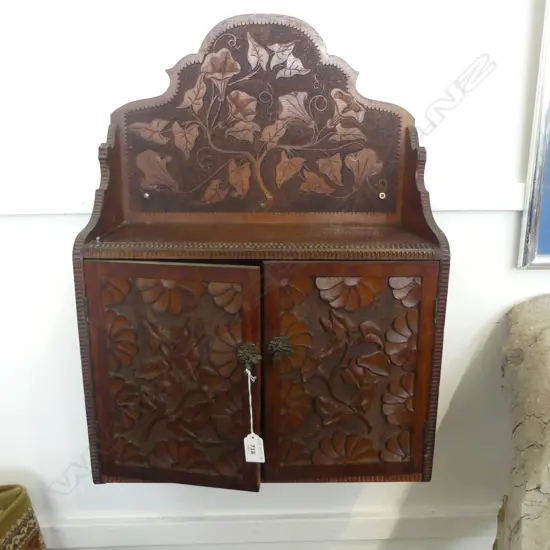 ARTS & CRAFTS CARVED WALL HANGING CABINET, H.750x470mm, note: sign old borer to top shelf