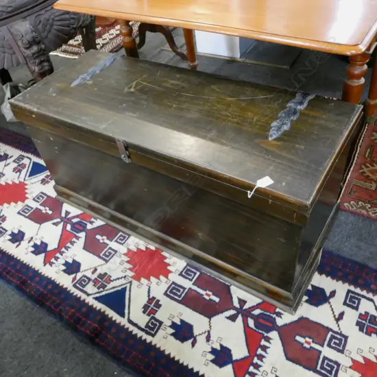 Vintage dark stained PINE TRUNK. hinged lid. some chips to edge molding W.1080mm