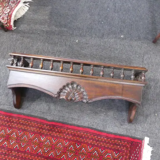 CARVED MAHOGANY SHELF w. TURNED GALLERY W.760mm