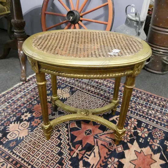FRENCH STYLE GILDED OVAL SIDE TABLE H.490mm CANED TOP