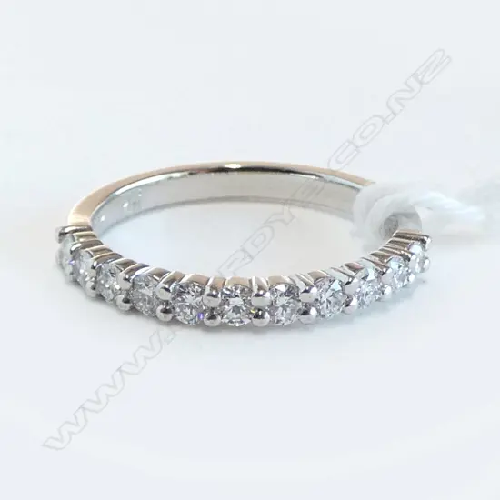 PLATINUM DIAMOND SET BAND, 3.2gm 11 dia=0.44ct size L