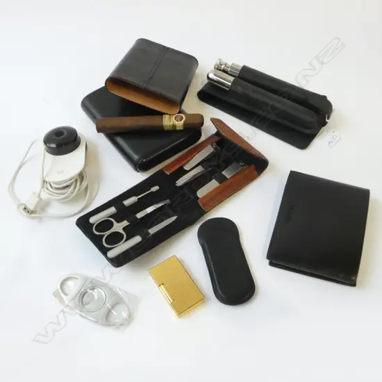 8 ITEMS; 3 BLACK LEATHER CASES; WALLET + 2 CIGAR, 2 CUTTERS 1 ZINO DAVIDOFF, GP LIGHTER, WEB CAM, VANITY SET