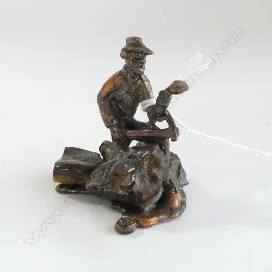 COPPER FIGURE OF OPAL MINER WITH ROUGH OPALS H.60mm